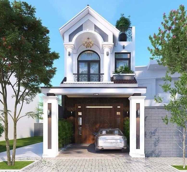 Mẫu nhà phố tân cổ điển 2 tầng với cửa chính được ốp gỗ sang trọng